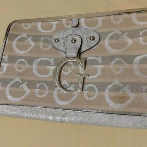 Guess purse and wallet. Have defect. See photo